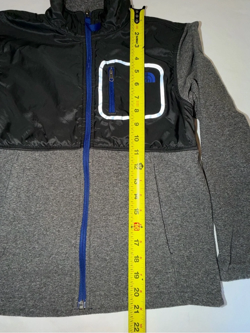 The North Face Kids Black and Gray Jacket with Blue Zip. C13,EMP